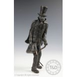 A 20th century bronzed statue of Dr Jekyll,