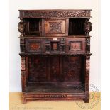 A marquetry inlaid and carved oak court cupboard, 17th century and later timbers,