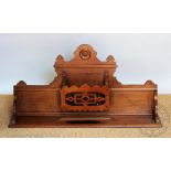 A late Victorian carved walnut organ top, with label for D'Almaine & Co,