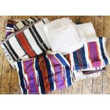 Six Nigerian West African strip woven rugs / throws, decorated with a dagger pattern,