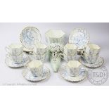 A Victorian Aesthetic part tea service, decorated with prunus flowers,