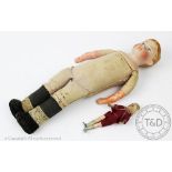 A Dura bisque shoulder boy doll, No 3, with bisque arms and stitched cloth body, 31cm,