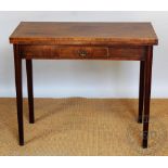 A late George III mahogany tea table, with drawer, on moulded and tapered legs,
