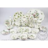 A large selection of Wedgwood Wild Strawberry pattern dressing table wares to include, vases,