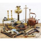 A collection of brass and copper items, to include; an oil lamp, a kettle,