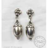 A pair of Georg Jensen sterling silver acorn design drop earrings,