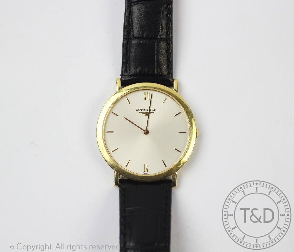 A Gentleman's Longines 18ct gold wrist watch,