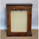 A Victorian walnut pier cabinet, with glazed door, on plinth base, the back altered,