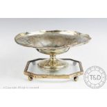 A silver pedestal bowl, Birmingham 1912, 21cm diam, with a silver mounted glass stand,