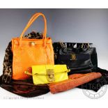 A collection of ladies large clutch bags and handbags,