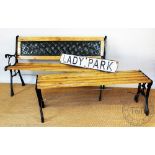 A painted metal garden bench, with Welsh oak slats, with a similar garden bench,