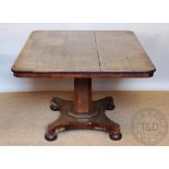 A 19th century oak breakfast table, of rectangular form, with platform and turned feet,
