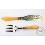 A pair of Victorian silver bladed and ivory handled fish servers, Joseph Rodgers & Sons,