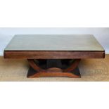 An Art Deco stained wood coffee table, converted from a dining table, with glass top,