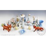 A selection of collectable ceramics, to include; a Beswick Fox and Corgi,