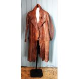 A vintage tan leather automobile / driving coat, with label for Husky, with tartan cotton lining,