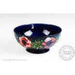 A large Moorcroft bowl, decorated in an anemone pattern,