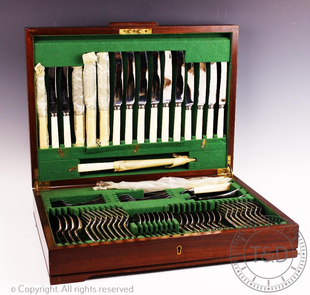 A Dixon & Sons silver plated canteen of cutlery comprising; eight table knives and forks,