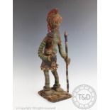 A West African tribal art Nigerian Yoruba beaded figure with sword and staff,