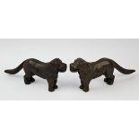 A pair of reproduction cast iron novelty nutcrackers, designed as dogs,