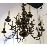 A Dutch style brass ceiling light, ten light, cast with a double headed eagle,