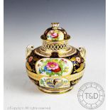 A late 19th century Crown Staffordshire Imari palatte pot pourri, of compressed globular form,