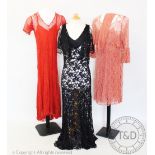 A selection of vintage ladies dresses, to include; a red corded lace maxi dress,