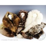A collection of fur and faux fur collars and stoles to include; a rabbit collar,