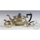 An assembled silver bachelors tea service, comprising; a teapot, Birmingham 1926, 14.