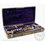 A French rosewood and nickel plated bassoon by Triebert of Paris, two pieces numbered 4802,