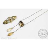 A citrine or smokey quartz set lavalier necklace,