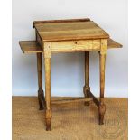 An early 20th century light oak school desk,.