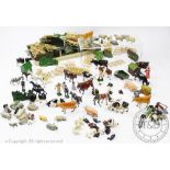 A large collection of Britains and other diecast farm series toys, including various horses, cattle,