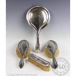 A silver backed four piece dressing table set, Deakin & Francis,