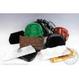 A collection of ladies purses and clutch bags,