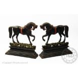 Two Greenlees of Glasgow cast iron door stops, modelled as horses, one a No.3, the other a No.
