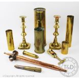 A selection of early 20th century copper and brass wares to include a military shell case,