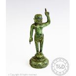 A Chinese bronze figure of the Infant Buddha, cast in the Ming taste,