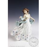 A Lladro 'Summer Serenade' figure,