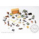 A collection of Britains and other diecast zoo series toys, to include a polar bear, elephant,