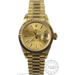 A ladies 18ct yellow gold Rolex Oyster perpetual date-just wristwatch,