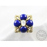 A lapis lazuli, moonstone and diamond set yellow gold ring in Boucheron style,