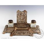 A large early 20th century silver plated desk stand,