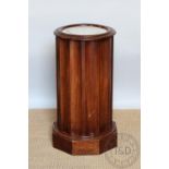 A Victorian walnut cylindrical pot cupboard, with marble top, on octagonal base,