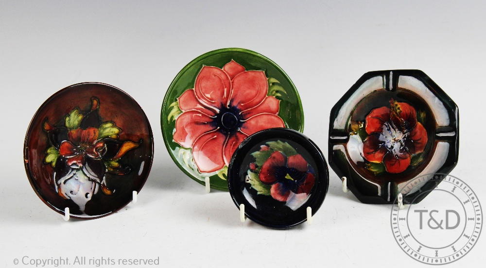 Four pieces of Moorcroft, comprising; an octagonal ashtray decorated in a hibiscus pattern,