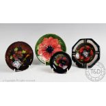 Four pieces of Moorcroft, comprising; an octagonal ashtray decorated in a hibiscus pattern,