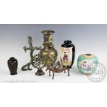 A Japanese bronze vases, decorated with calligraphy and a white metal flower, 11cm,