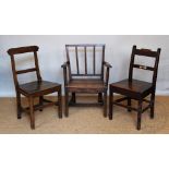 A George III oak country kitchen chair, with arms and solid seat, 84cm H,