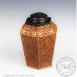 A late 18th century salt glazed stoneware octagonal tea caddy,