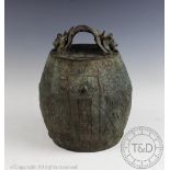 A Chinese bronze archaic bell, Zhong, decorated in the manner of Eastern Zhou Dnasty examples,